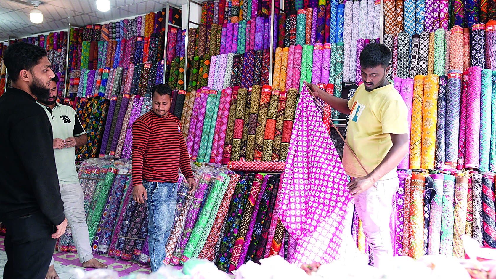 Customers and team on the Dream Textiles sales floor