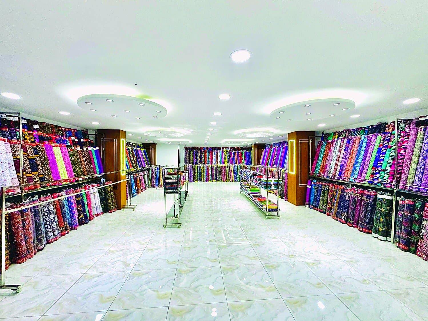 Printed fabric collection on showroom shelves